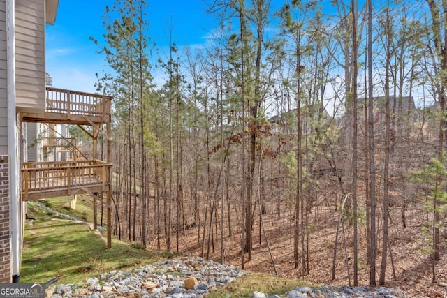 view of yard with a wooden deck