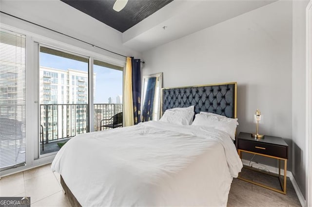 250 Pharr Rd Unit 1702, Atlanta, GA 30305 - bedroom featuring access to exterior, a ceiling fan, and light tile patterned floors