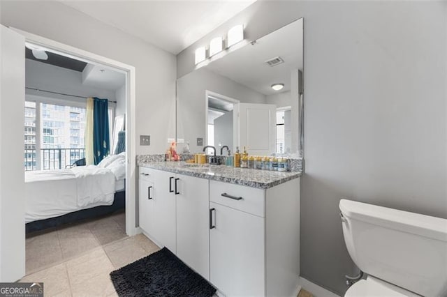 250 Pharr Rd Unit 1702, Atlanta, GA 30305 - bathroom with ensuite bath, vanity, and tile patterned floors