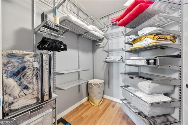 250 Pharr Rd Unit 1702, Atlanta, GA 30305 - spacious closet featuring wood finished floors