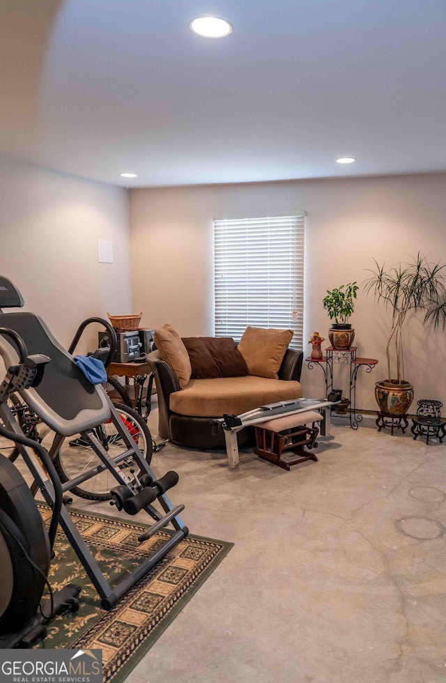 workout area featuring recessed lighting