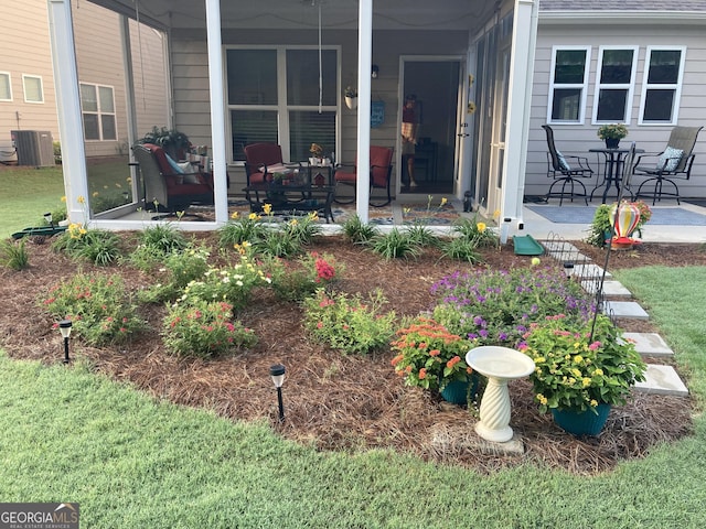 view of yard with central AC