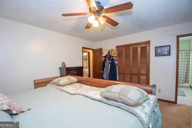 1972 Cox Dr, Austell, GA 30168 - bedroom featuring ceiling fan, carpet, a closet, and ensuite bath