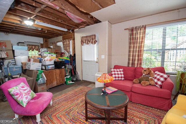 1972 Cox Dr, Austell, GA 30168 - living room with concrete flooring and a healthy amount of sunlight