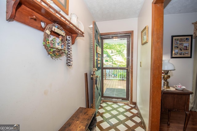 1972 Cox Dr, Austell, GA 30168 - doorway to outside featuring a textured ceiling