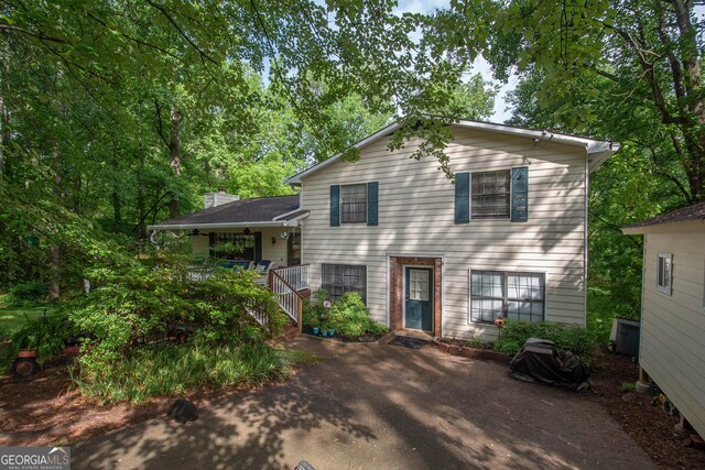 1972 Cox Dr, Austell, GA 30168 - tri-level home with a porch