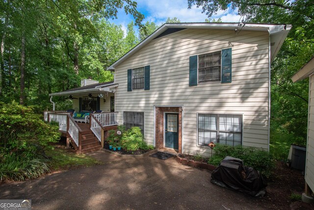 1972 Cox Dr, Austell, GA 30168 - tri-level home featuring a porch