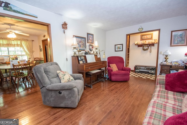 1972 Cox Dr, Austell, GA 30168 - living room featuring a ceiling fan and wood finished floors