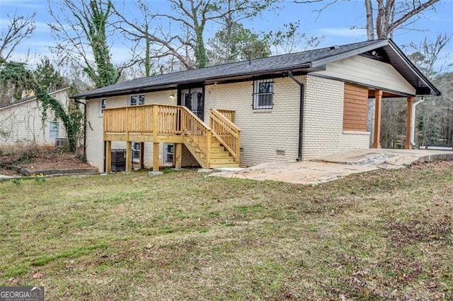 single story home featuring brick siding, a patio area, stairs, a front yard, and crawl space