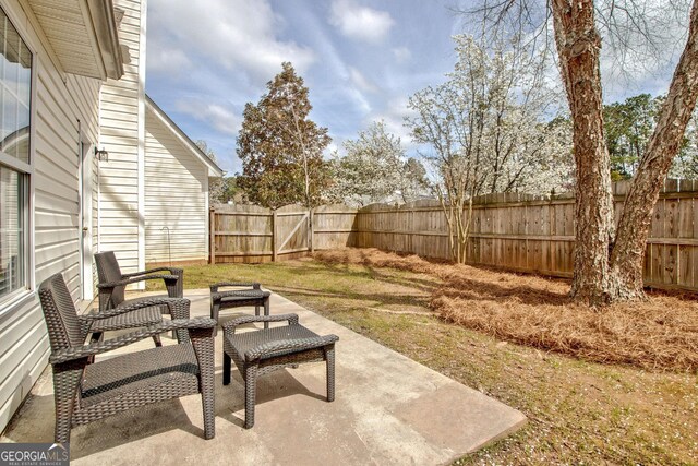 view of patio with a fenced backyard