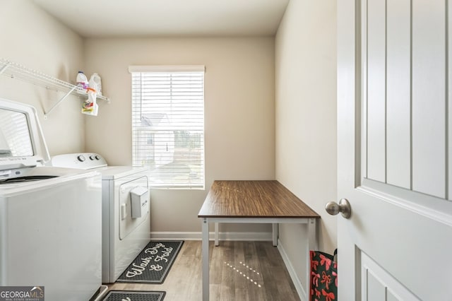 197 Stocks Cir, West Point, GA 31833 - clothes washing area with baseboards, wood finished floors, independent washer and dryer, and laundry area
