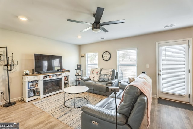 197 Stocks Cir, West Point, GA 31833 - living room with recessed lighting, wood finished floors, visible vents, baseboards, and ceiling fan