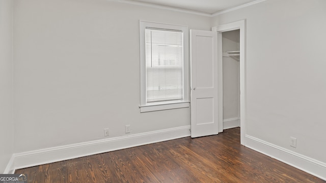 1132 Fair St SW, Atlanta, GA 30314 - unfurnished bedroom with dark wood-type flooring, baseboards, and crown molding