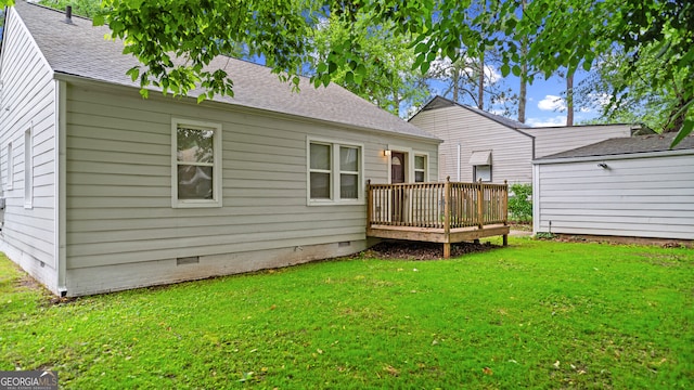 1132 Fair St SW, Atlanta, GA 30314 - back of house with crawl space, a wooden deck, a lawn, and a shingled roof