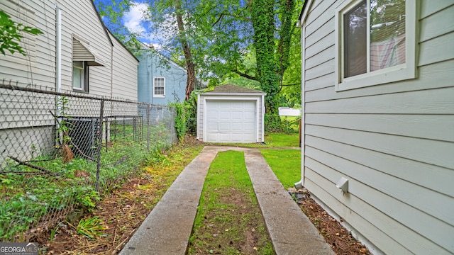 1132 Fair St SW, Atlanta, GA 30314 - view of yard featuring an outdoor structure and driveway