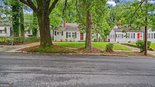 1132 Fair St SW, Atlanta, GA 30314 - view of front of house featuring a chimney and a front lawn