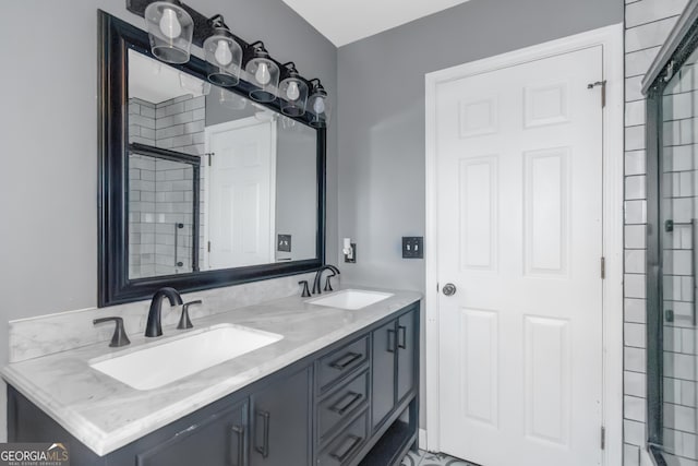 bathroom featuring double vanity and a sink