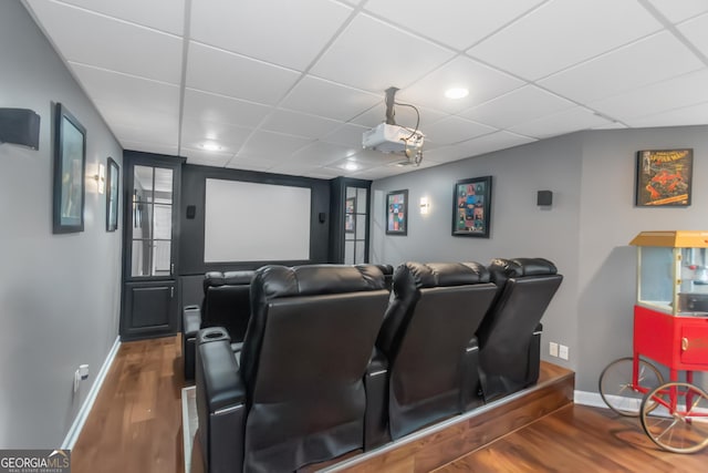 305 Worthing Ln, Mcdonough, GA 30253 - home theater room with wood finished floors and a paneled ceiling