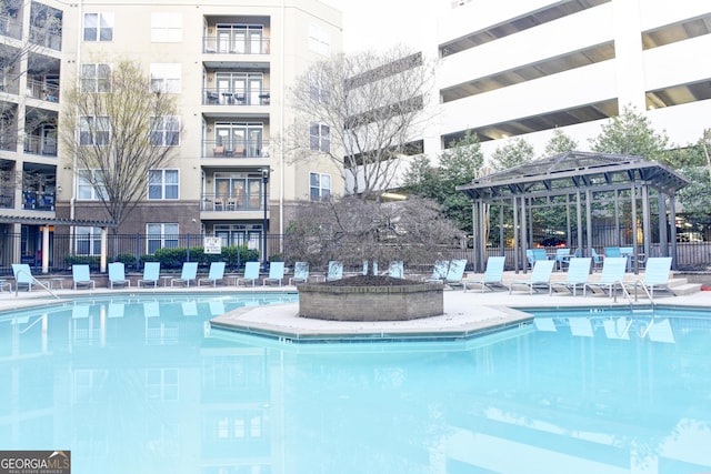 pool featuring fence