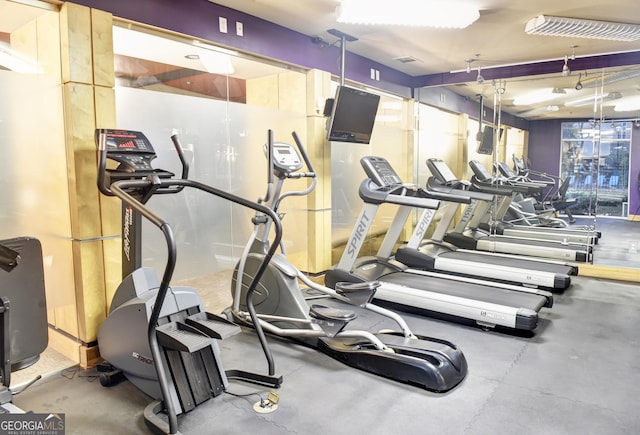 exercise room featuring visible vents