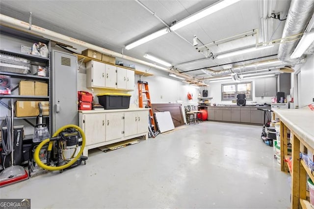 garage with a workshop area