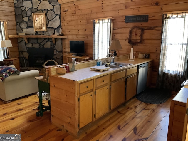 114 Palisade Dr, Ellijay, GA 30540 - kitchen featuring light countertops, a sink, stainless steel dishwasher, and light wood-type flooring