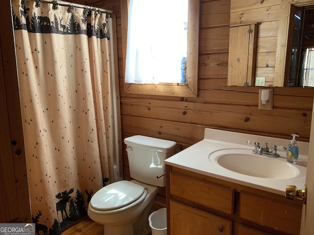 114 Palisade Dr, Ellijay, GA 30540 - full bath featuring curtained shower, wood walls, toilet, and vanity