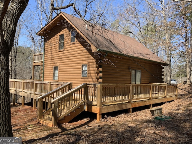 114 Palisade Dr, Ellijay, GA 30540 - back of property featuring log exterior, a shingled roof, and a wooden deck