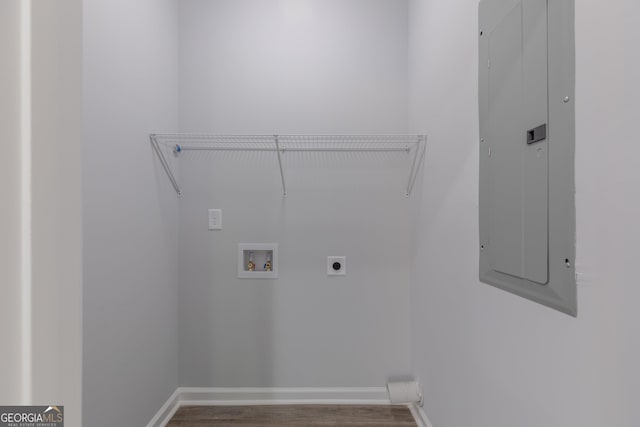 laundry room with washer hookup, electric panel, laundry area, wood finished floors, and hookup for an electric dryer