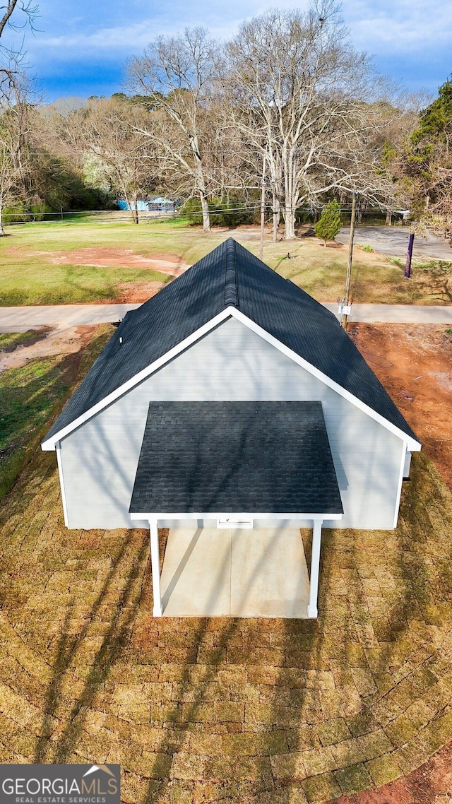 view of home's community with a yard