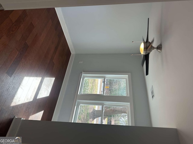 unfurnished living room featuring wood finished floors