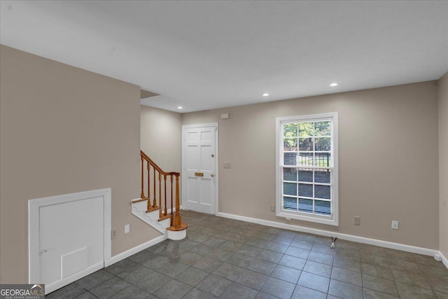 entrance foyer featuring tile patterned flooring, stairway, recessed lighting, and baseboards