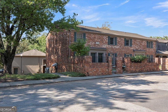 view of front of house with brick siding