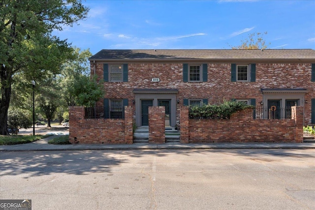 view of front of property with brick siding