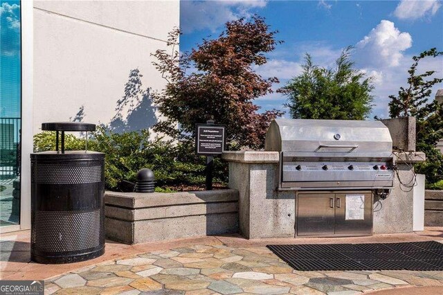 3324 Peachtree Rd NE Unit 1115, Atlanta, GA 30326 - view of patio featuring area for grilling and a grill