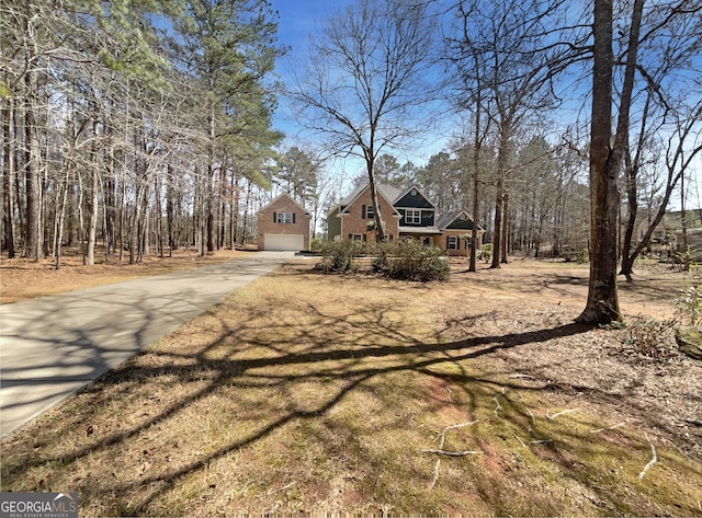 view of front of home with an attached garage and driveway