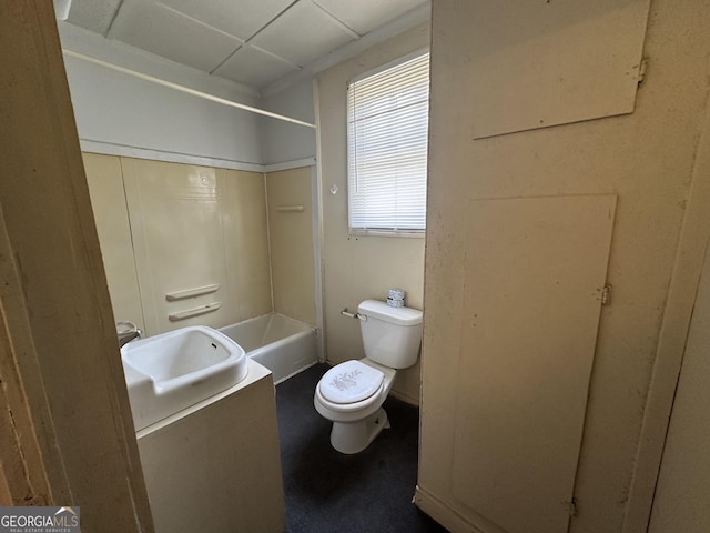 full bath featuring bathing tub / shower combination, toilet, and vanity