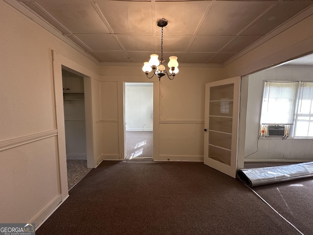 unfurnished dining area with cooling unit, an inviting chandelier, and dark colored carpet