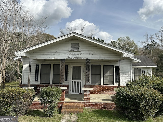 bungalow-style home with covered porch