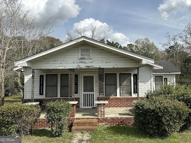 bungalow-style home featuring a porch