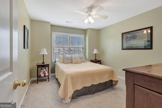 2510 Shoreline Pkwy, Villa Rica, GA 30180 - bedroom featuring light colored carpet, baseboards, and ceiling fan