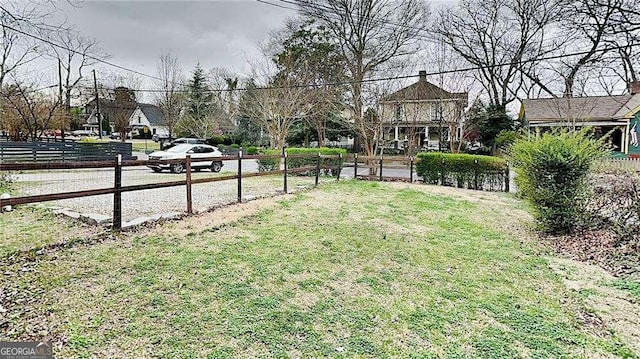 view of yard featuring fence