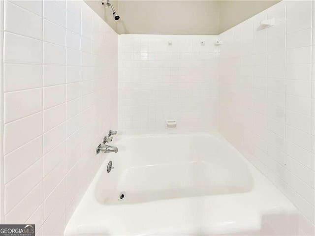 full bathroom featuring washtub / shower combination