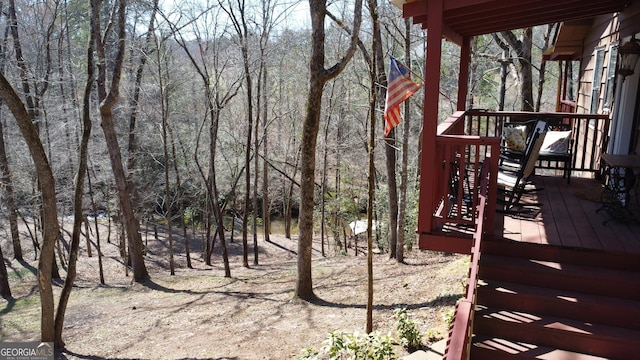 view of yard featuring a wooded view