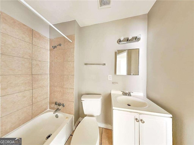 bathroom featuring vanity,  shower combination, toilet, and visible vents