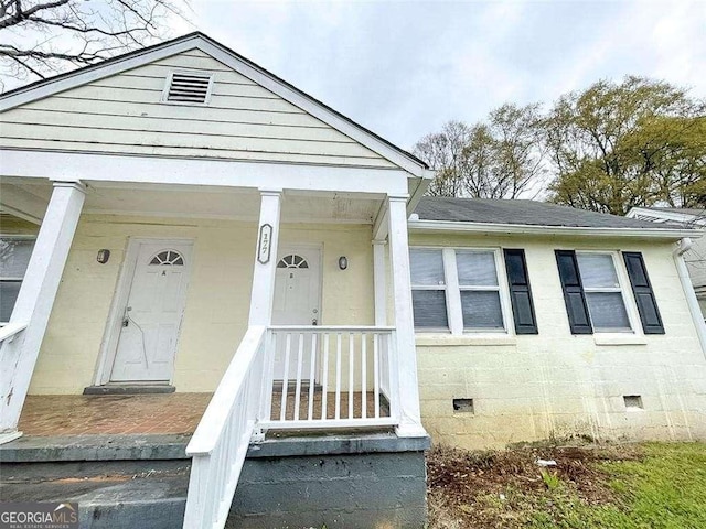 view of front of home with crawl space