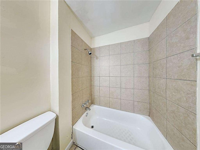 full bathroom with toilet and bathing tub / shower combination