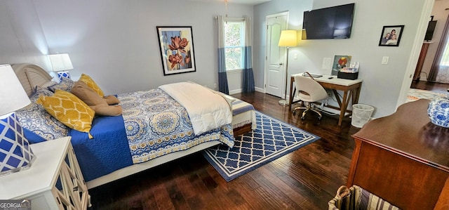 bedroom featuring hardwood / wood-style floors