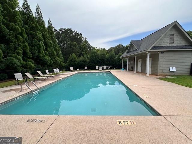 pool featuring a patio