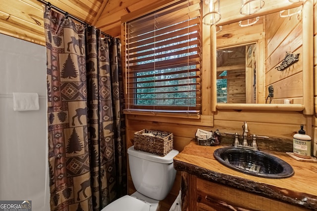 full bath featuring wooden walls, toilet, lofted ceiling, wooden ceiling, and vanity